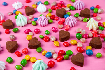 Sweets on a pink table. Valentine's day.