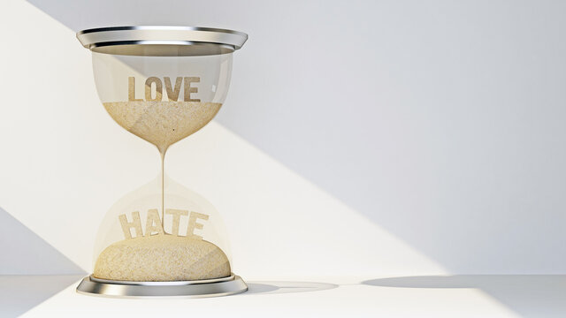 concept hourglass with text love and hate