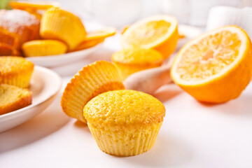 Fototapeta na wymiar Homemade delicious lemon muffin cupcakes on the white table