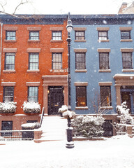 Colorful buildings at Joralemon st in Brooklyn, New York, snow storm, winter