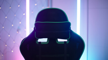 Empty vtuber gaming chair in cyberspace room with haze template © Video_StockOrg