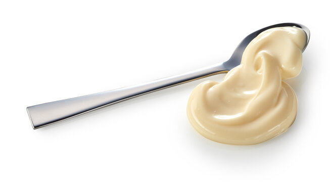 Spoonful of creamy homemade mayonnaise