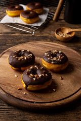 Donuts on wooden table background