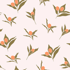 Seamless pattern with green leaves and orange berries