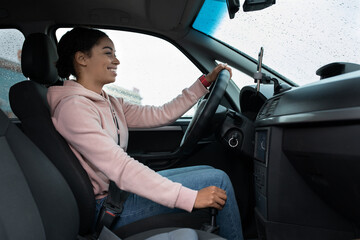 Portrait of young woman driver relaxing enjoy trip with friend