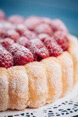 Delicious french Charlotte cake with raspberries