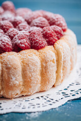 Delicious french Charlotte cake with raspberries