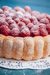 Delicious french Charlotte cake with raspberries