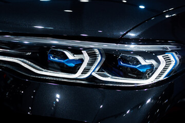 Detail of car LED headlights lamp of new cars
