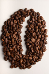 beans forms the shape of a coffe bean. beans