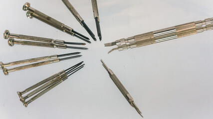 Spring bar tool and spring bars. Spring bar tool used to remove spring bars to change watch strap.