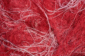 red fishing net closeup texture and pattern