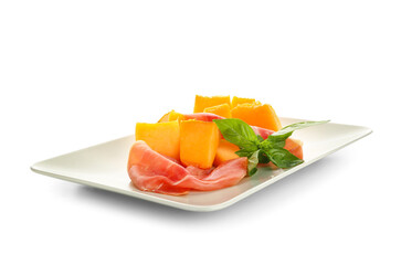 Plate with delicious melon and prosciutto on white background