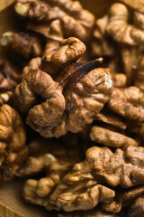 Background of fresh walnuts. Selective focus, macro