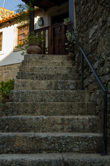 Fototapeta na wymiar Stone stairs of picturesque village house