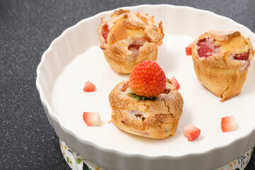 Homemade Strawberry cake topping with icing sugar. Sweet food. Sweet dessert. perfect summer season dessert served on plate.
