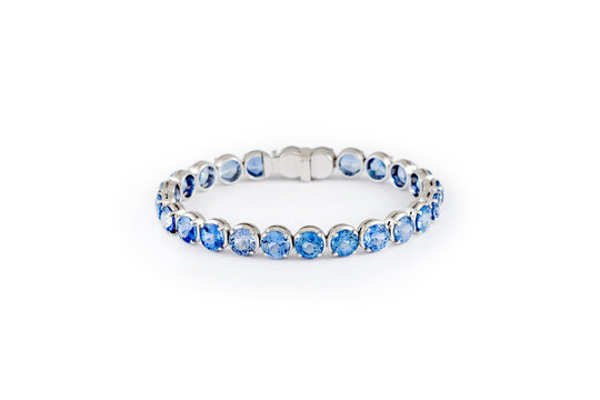 Fashion blue sapphire bracelet on white background. Jewelry theme.