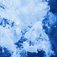 Blue ink and watercolor frost texture on white paper background. Paint leaks and decalcomania effects. Hand-painted gouache abstract image. Mess on the canvas.