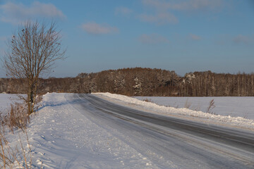 road in a snowy field