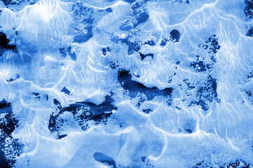 Blue ink and watercolor frost texture on white paper background. Paint leaks and decalcomania effects. Hand-painted gouache abstract image. Mess on the canvas.