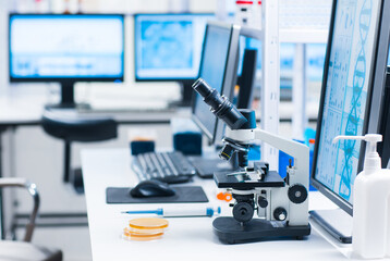 Interior of modern scientific research laboratory. Genetic engineer workplace. Future technology and science.