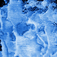 Blue ink and watercolor frost texture on white paper background. Paint leaks and decalcomania effects. Hand-painted gouache abstract image. Mess on the canvas.