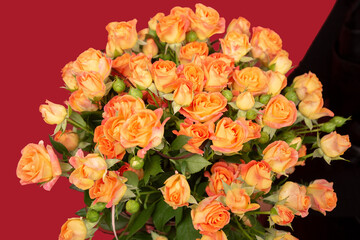 Bunch of a beautiful light orange tea roses