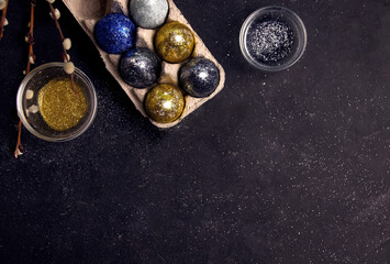 DIY Easter. Eggs decorated with sequins. Copy space. Modern style