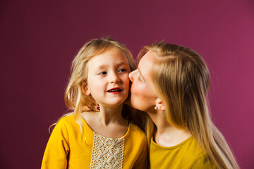 Mother and daughter in studio, happy moments