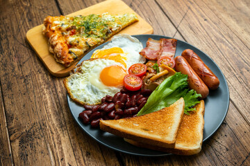 Rustical breakfast eggs, sausages, vegetables