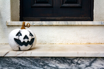 Halloween pumpkin at home entrance door