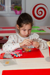 
little girl making caramel candy