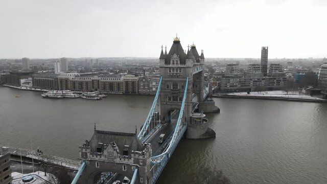 Amazing aerial View of the Iconic Tower Bridge London, taken in a snow day winter 2021.