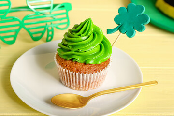 Tasty cupcake for St. Patrick's Day on table