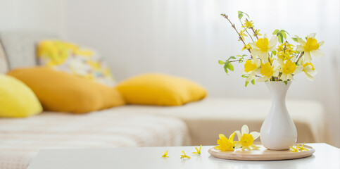 spring flowers in vase on modern interior
