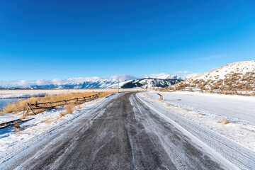 Road with snow and cold weather in the Grand Teton National Park, Wyoming 