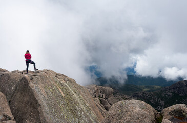 person on the top of mountain in brazil