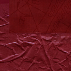 Red and brown torn paper collage close-up. Texture made from various paper and cardboard parts. Damaged old paper background. Vintage blank wallpaper. Material design backdrop.
