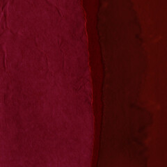 Red and brown torn paper collage close-up. Texture made from various paper and cardboard parts....
