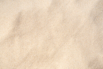 Fototapeta na wymiar Sand Texture. Brown sand. Background from fine sand. Close-up.