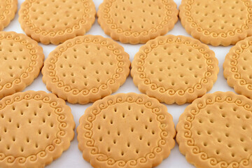 Round cookies on the table close-up.