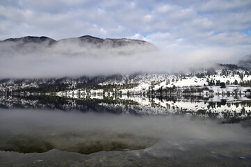 Morning fog on lake Bohinj, Slovenia