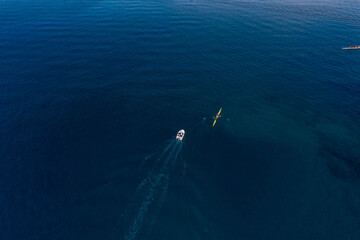 Aerial drone shot of boat kayak in Adriatic sea at Zadar peninsula in Croatia
