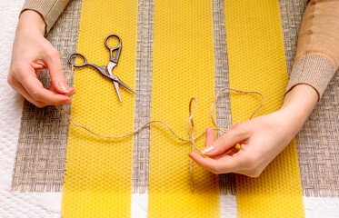 The process of making wax candles with your own hands. Step-by-step instruction. Step 1. Preparation of accessories: wax plate, scissors, jute. Cutting the wax plate into pieces.
