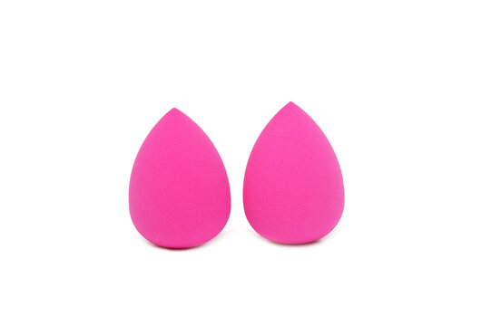 Two Pink Makeup Sponges On A White Background