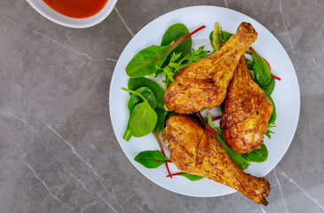 Balanced lunch with grilled chicken and salad.