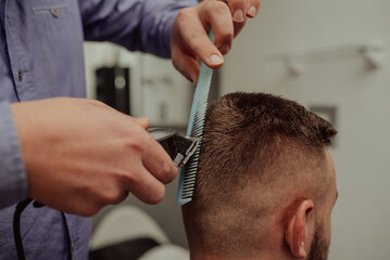 Young Man in Barbershop Hair Care Service ConceptYoung Man in Barbershop Hair Care Service Concept