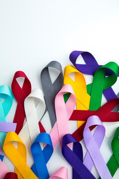 Colorful cancer ribbons as Health symbols for all types of cancers with copy area