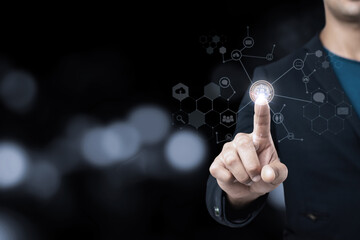 Businessman pointing digital bitcoin icon. Concept of the rise in prices for bitcoin. Increase in value of cryptocurrencies. Futuristic stock exchange.