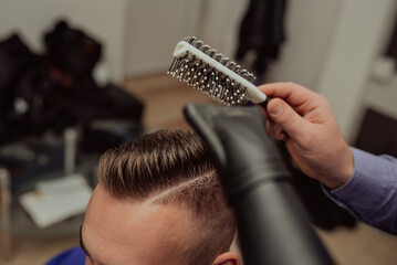 Young Man in Barbershop Hair Care Service ConceptYoung Man in Barbershop Hair Care Service Concept